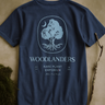 Navy blue Woodlanders t-shirt, front view.